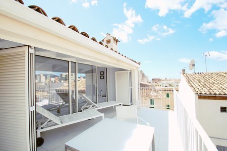 Modern loftlägenhet med terrasser